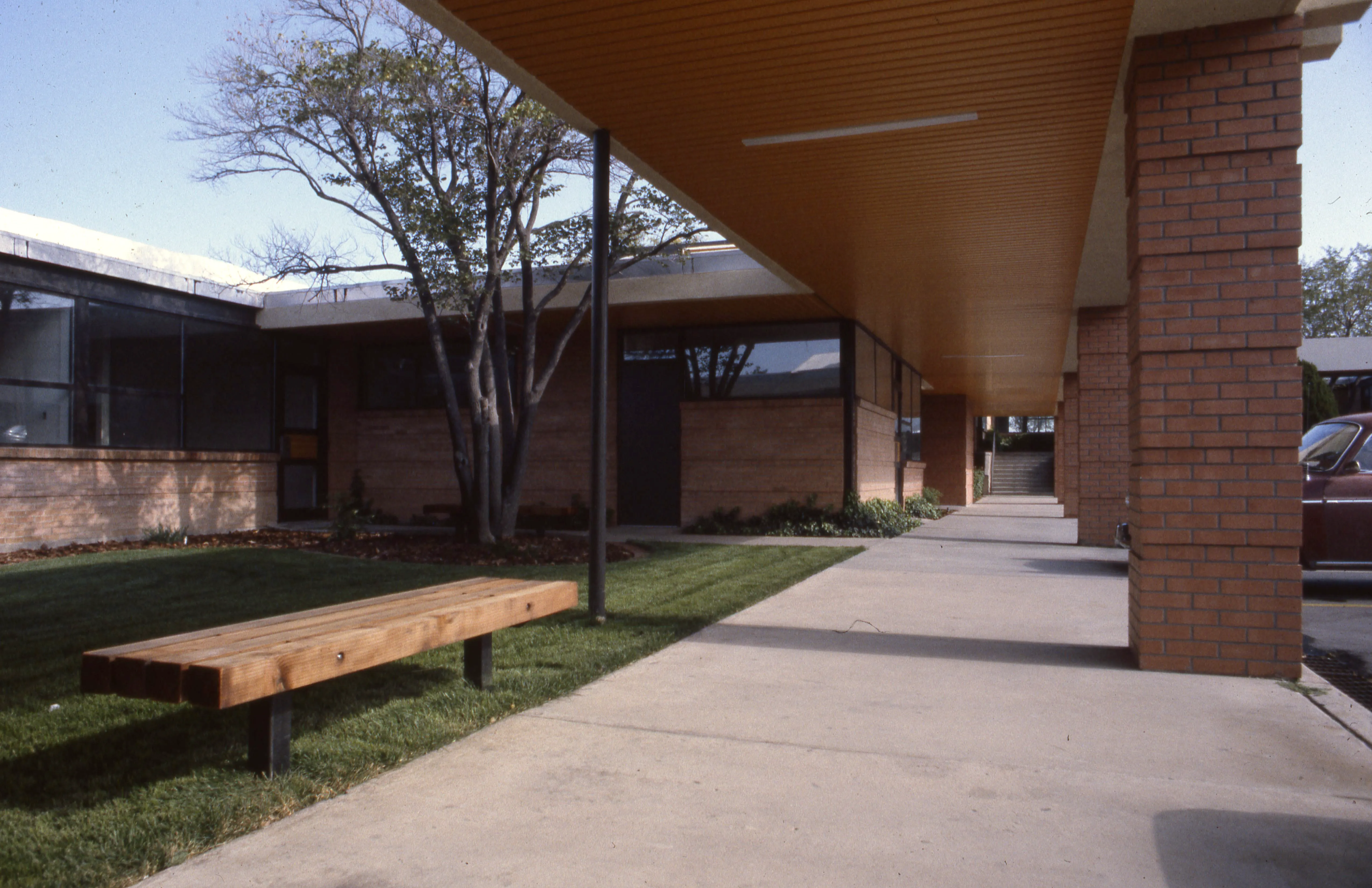 Courtyard landscape and covered walkway before alterationss