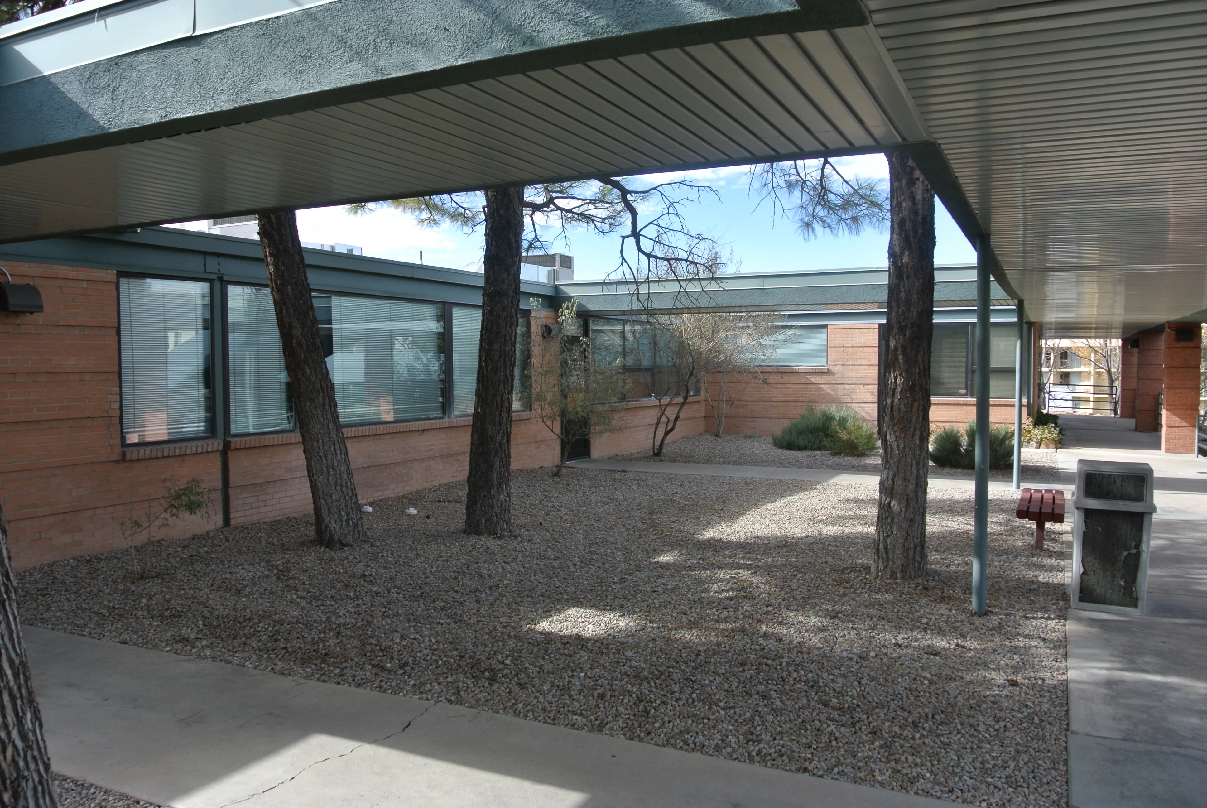 Courtyard landscape and covered walkway after alterations