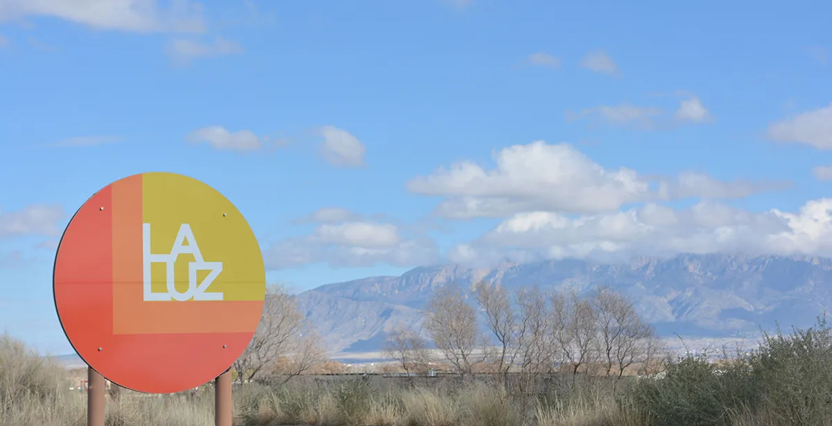 Sign with Sandia Mountains at La Luz